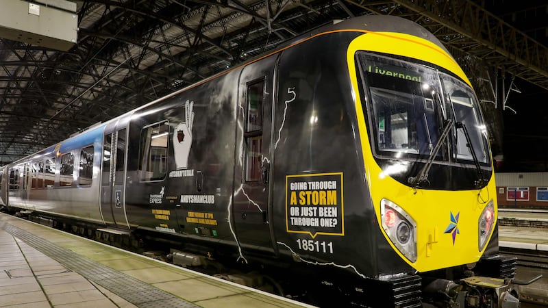 A train has been given new livery to remind passengers ‘it’s OK to talk’ as part of a campaign raising awareness of men’s mental health (TransPennine Express/PA)