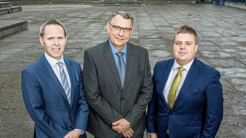 Pictured are: Michael Neill, head of office in Belfast at Top 100 sponsor A&amp;L Goodbody; Flavio Malnarcic, chief financial officer, Moy Park; and Ulster Business editor, John Mulgrew. 