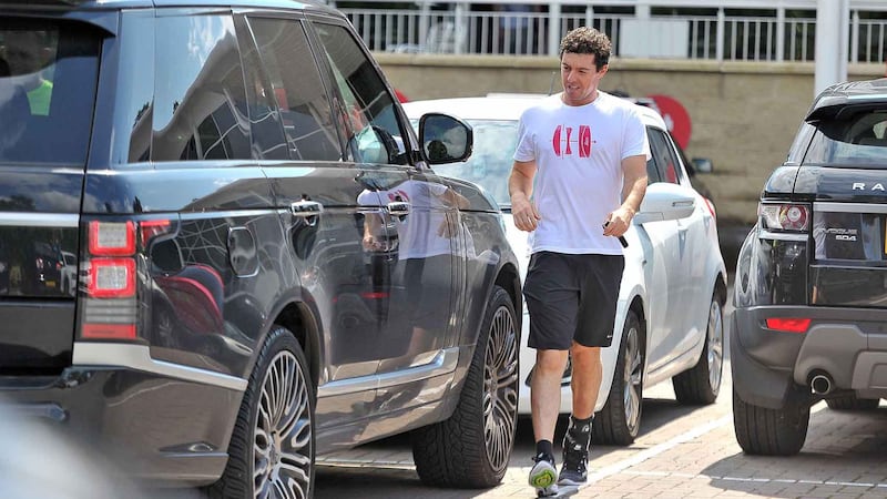 Rory McIlroy (pictured) leaves&nbsp;the Virgin Active Health Club outside Holywood where his rehab is progressing