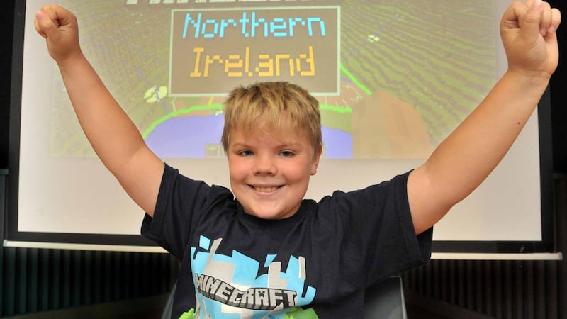 Nine year-old Nathan Hardy from Ballyhome Primary School celebrates the arrival of  'Minecraft Northern Ireland' at the the launch today in the Stormont Pavillion