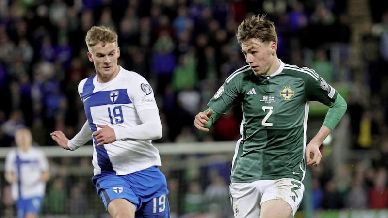 Northern Ireland&#39;s Conor Bradley (right) and Finland&#39;s Marcus Forss in action.