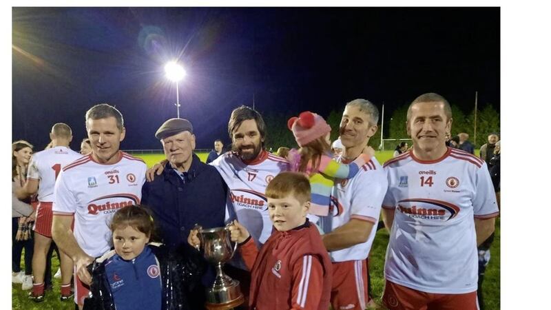 Former Tyrone senior stars Conor Gormley, Ryan McMenamin, Ciaran Gourley and Stephen O&#39;Neill celebrate their latest All-Ireland after lifting the masters title on Saturday evening 