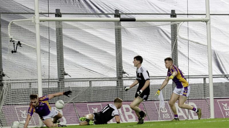 Jerome Johnston bags the goal that secured Kilcoo&#39;s status as All-Ireland club champions. Picture by Philip Walsh 