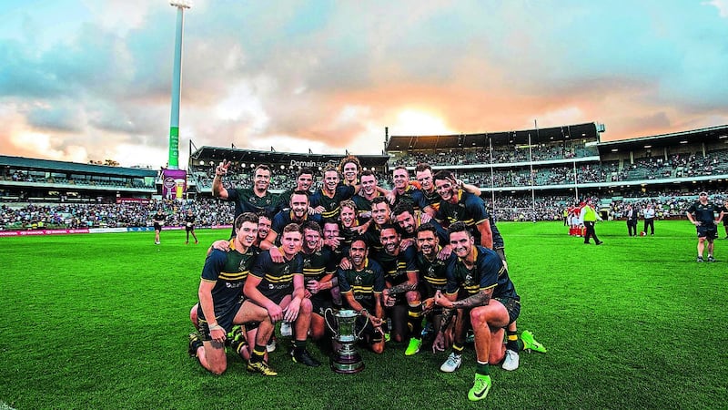 Australia celebrate with the Cormac McAnallen Cup after clinching the International Rules series in Perth on Saturday Picture by Inpho
