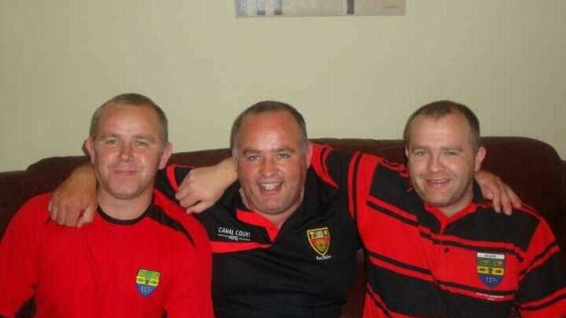 Johnny McGrattan, pictured on the right with his brothers Barry (left) and Peter (middle) 
