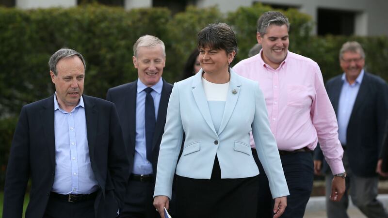 <strong>CATS WHISKERS:</strong> DUP leader Arlene Foster (centre) with MPs at the Stormont Hotel after Prime Minister Theresa May has announced that she will work with &ldquo;friends and allies&rdquo; in the DUP to enable her to lead a government.&nbsp;