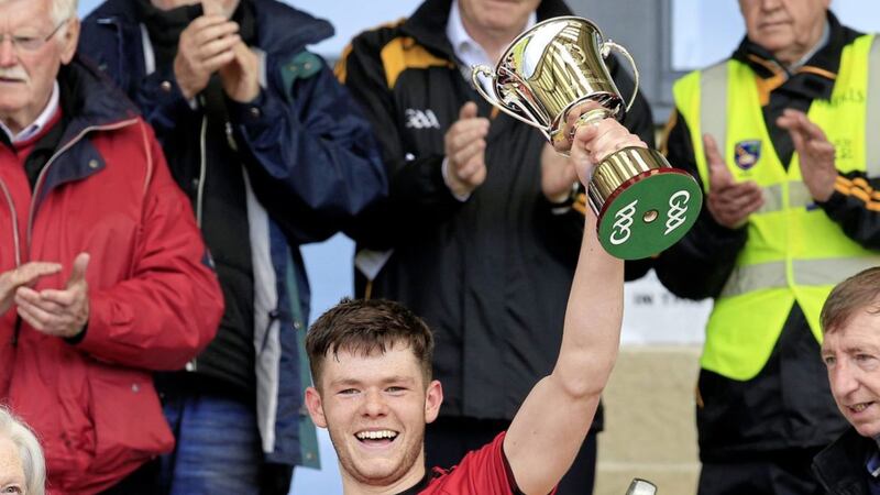Down U20 captain Shane Annett raises the Leo Murphy Cup last week in Armagh Picture by Philip Walsh. 