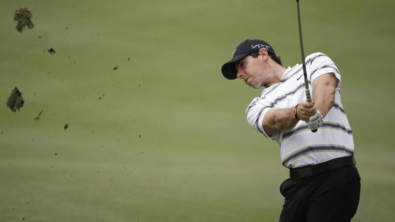 Rory McIlroy hits a shot on the second fairway during a practice round for the Players Championship Picture: AP 