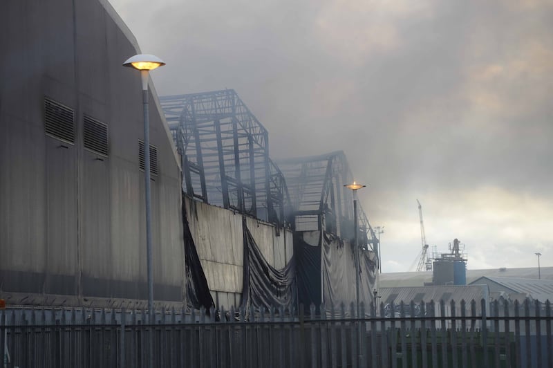The fire at Devenish's Duncrue Street distribution centre burned for a number of days in November 2019. Picture by Mark Marlow.