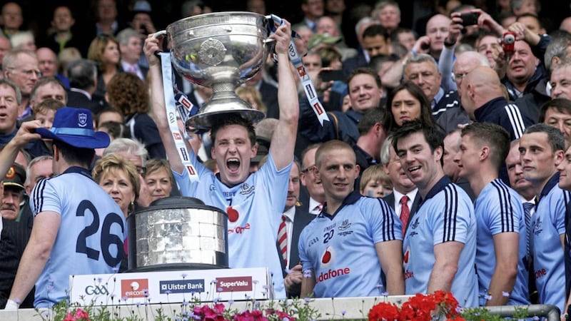 Kevin Nolan holds aloft the Sam Maguire Cup after Dublin&#39;s 2011 All-Ireland final victory over Kerry. Picture by Seamus Loughran 