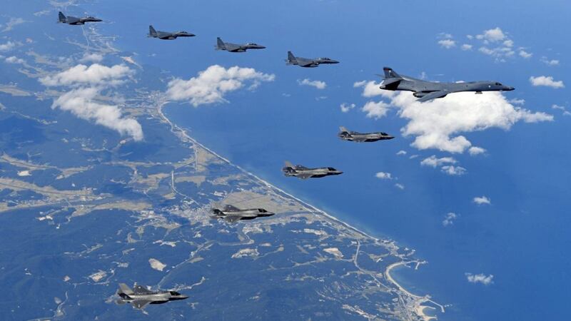 US Air Force B-1B bombers, F-35B stealth fighter jets and South Korean F-15K fighter jets fly over the Korean Peninsula during a joint drills on Monday. Picture by South Korea Defense Ministry via Associated Press. 