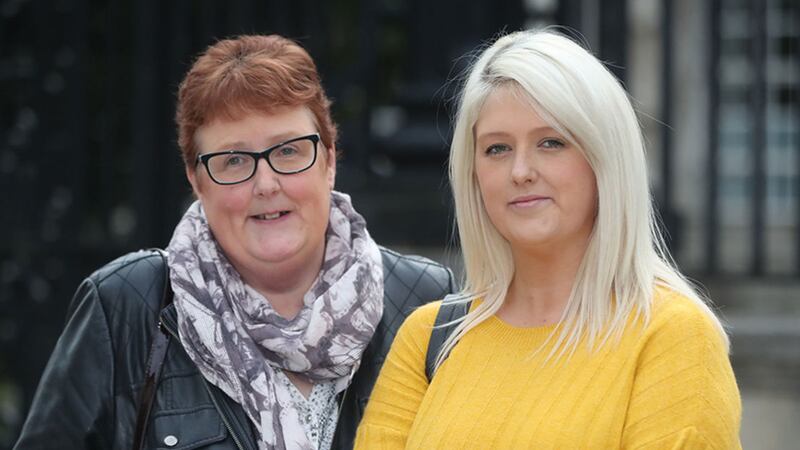 Sarah Ewart (right) and her mother Jane Christie outside the High Court in Belfast this morning&nbsp;