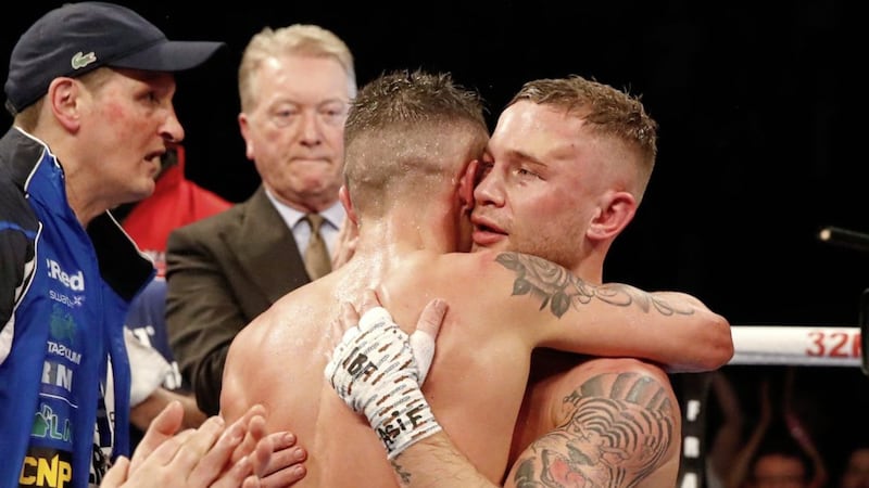 Josh Warrington (right) and Carl Frampton embrace after the World Featherweight Championship last month. Hopefully there is one last rage against the dying light for Frampton 