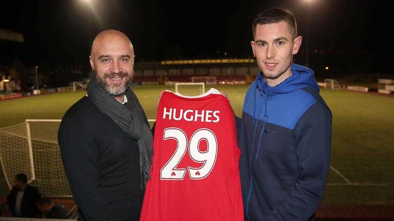 New signing Daniel Hughes with Cliftonville manager Gerard Lyttle at Solitude on Thursday night<br />Picture by Declan Roughan