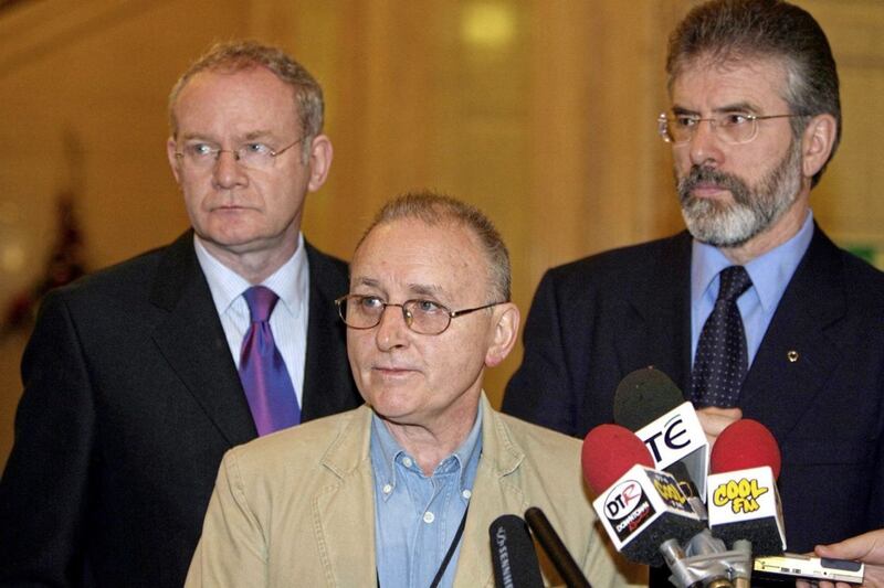 (L-r) Martin McGuinness, Denis Donaldson and Gerry Adams in Stormont in 2005. Picture by Paul Faith, Press Association