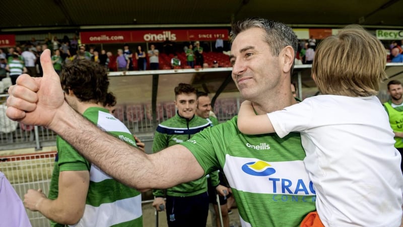 Fermanagh manager Rory Gallagher with his son Seanie after his side&#39;s surprise win over Monaghan that&#39;s left them within 70 minutes of a first ever Ulster title. Photo by Oliver McVeigh/Sportsfile. 