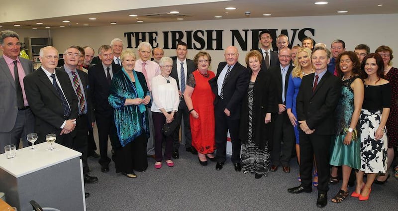 A gathering of opinion page contributors and senior staff of The Irish News in the newsroom this week. Picture by Hugh Russell 