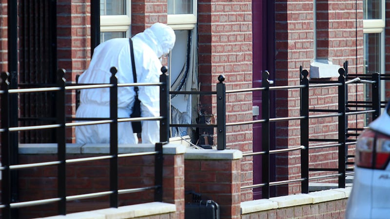 Police forensics at the scene of the pipe bomb attack on a house in Mill Street, Lambeg. Picture Mal McCann&nbsp;