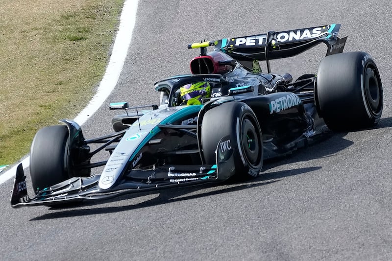 Lewis Hamilton endured a tough afternoon at the Japanese Grand Prix (Hiro Komae/AP)