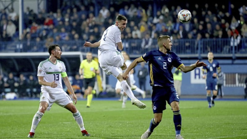 Northern Ireland&#39;s Gavin Whyte (centre) comes close to scoring in Sarajevo - but no cigar. 