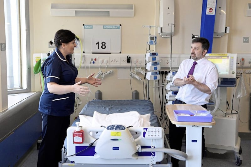 Health Minister Robin Swann and Chief Nursing Officer Charlotte McArdle during a visit to the Nightingale hospital in Belfast. Picture by Michael Cooper, Press Association