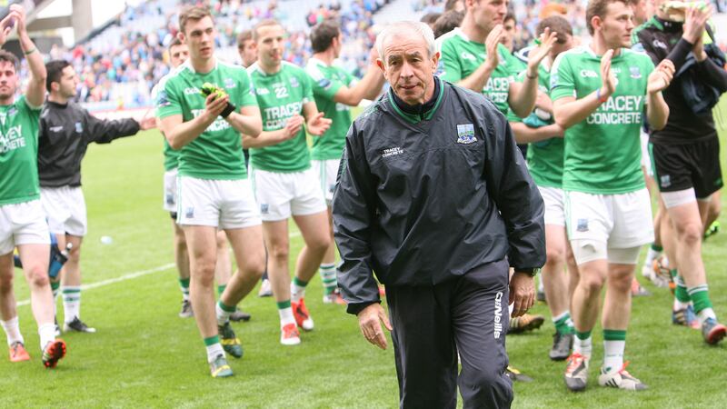 Pete McGrath and his Fermanagh players salute their supporters at the end of Sunday's All-Ireland SFC quarter-final at Croke Park<br/>Picture: Colm O'Reilly