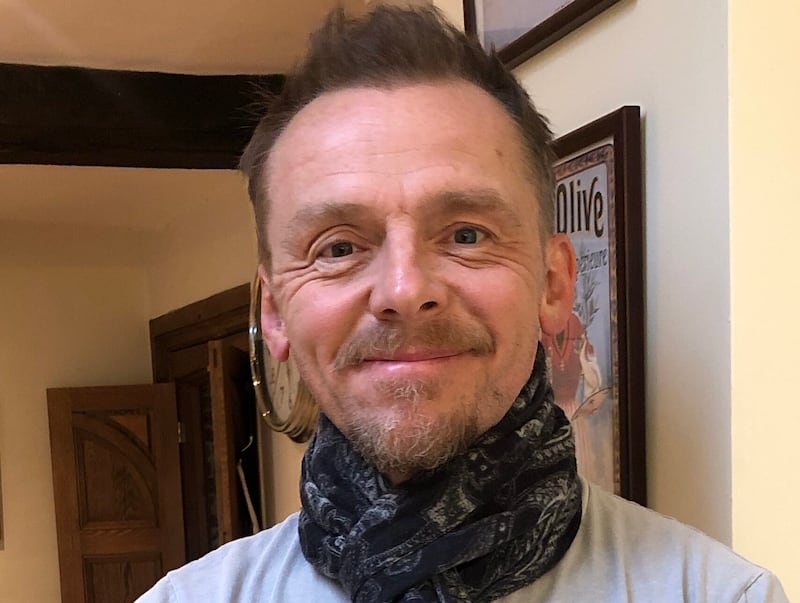 Simon Pegg is auctioning off a scarf 