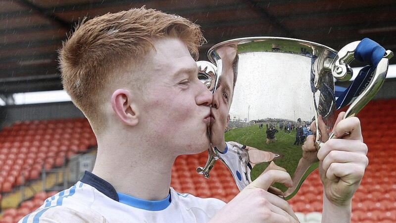 St Mary's, Magherafelt winning captain Declan Cassidy kisses the MacRory Cup
