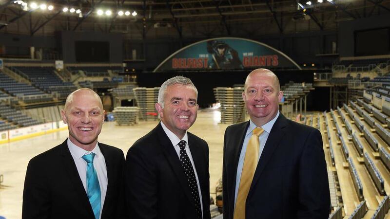 Enterprise Minister Jonathan Bell (centre) pictured at the Odyssey Arena with Odyssey Trust Operations Director Adrian Doyle and Belfast Giants manager Steve Thornton. Picture by Darren Kidd / Press Eye.   