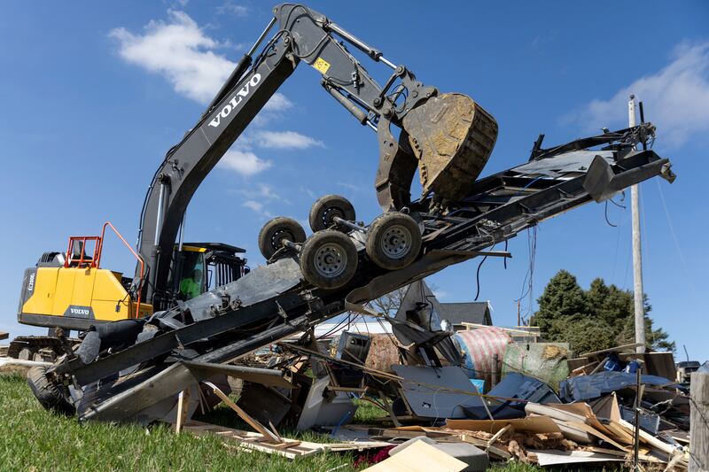 A clean-up operation takes place in Iowa (Anna Reed/Omaha World-Herald via AP)