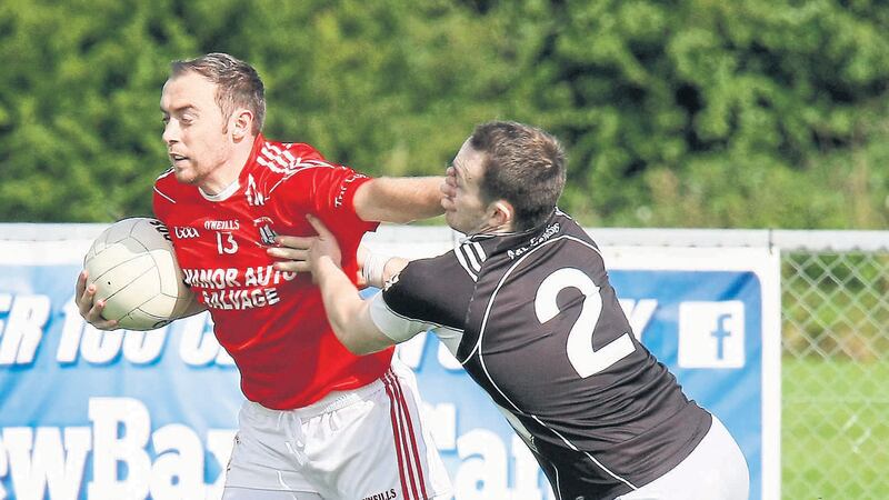 Eglish&rsquo;s Aaron Daly gets a hand in the face from Trillick&rsquo;s Niall Gormley during Sunday&rsquo;s Tyrone SFC clash in Augher. Picture: Jim Dunne&nbsp;