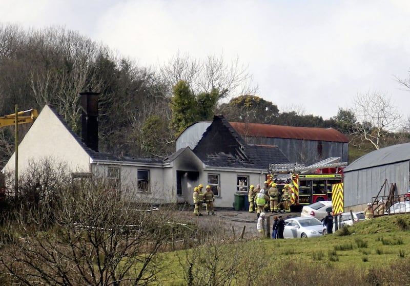 The remains of a house in Derrylin where three people died following a house fire. Picture by Mal McCann