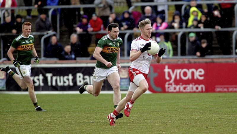 25/3/2018 Tyrones  frank burns  gets away  from Kerrys daithi casey    in yesterdays NFL game at Healy Park    Picture Seamus Loughran. 