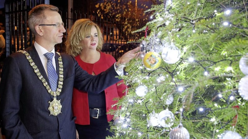 The Lord Mayor of Belfast Alderman Brian Kingston and singer Lisa Treanor at the Pips 'tree of lights' annual service &nbsp;