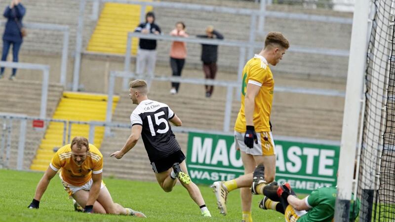 Jerome Johnston celebrates after scoring Kilcoo&#39;s first half goal during yesterday&#39;s victory over Clonduff, which moves the Magpies into the last eight of the Down championship. Picture by Philip Walsh 