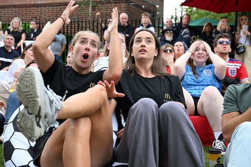 From left, footballers Maya Le Tissier and Anna Patten at a screening in St Albans of the England vs Columbia quarter-final match