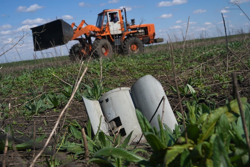 A fragment of a Russian missile in a farmer’s field in the Kharkiv region of Ukraine (Andrii Marienko/AP)