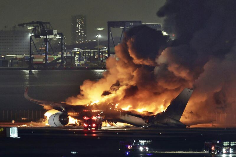 All 379 occupants of JAL Flight 516 were safely evacuated (Kyodo News/AP)