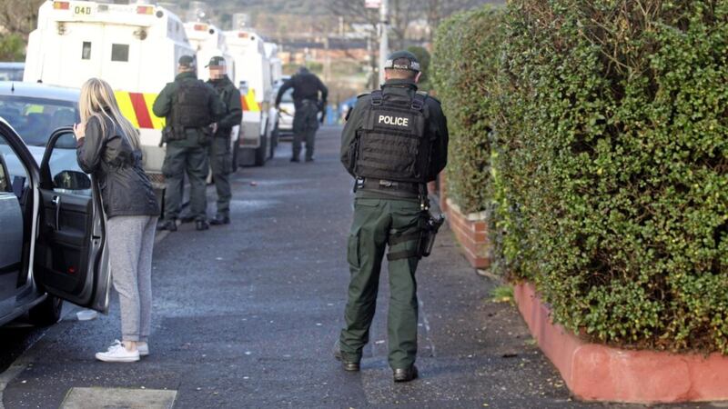 Police searches linked to the discovery of weapons in west Belfast. Picture Matt Bohill. 