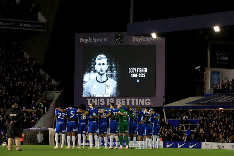 Players observe a minute’s silence for Cody Fisher ahead of the Sky Bet Championship match at St Andrew’s, Birmingham, on December 30 2022