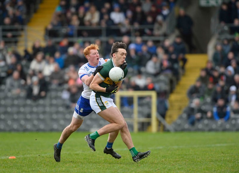 Kerry’s David Clifford is put under pressure from Monaghan’s Ryan O’Toole