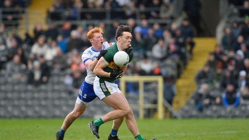 Kerry’s David Clifford is put under pressure from Monaghan’s Ryan O’Toole