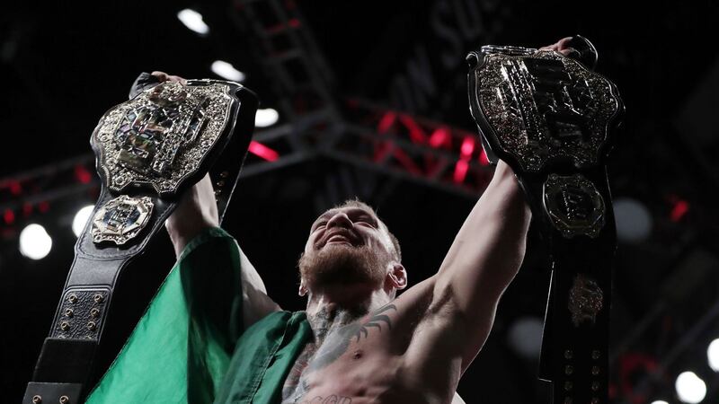 Conor McGregor became the first fighter to hold two UFC belts simultaneously after beating Eddie Alvarez in New York on Saturday night. Pictures by PA