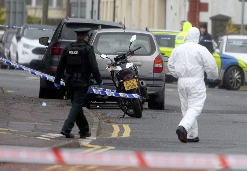 Forensic officers attend the scene in Downpatrick following the death of a 28-year-old man. Picture by Mal McCann 