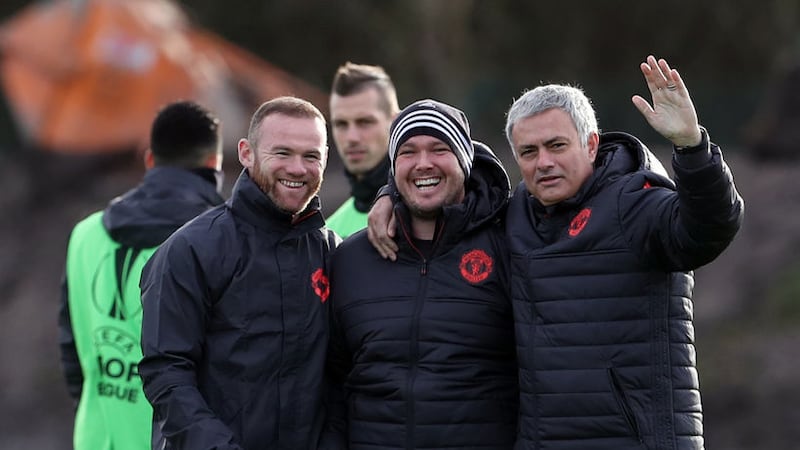 Manchester United's Wayne Rooney, massuer Rod Thornley and manager Jose Mourinho pose for a picture during Wednesday training session at their Carrington complex <br />Picture by PA&nbsp;