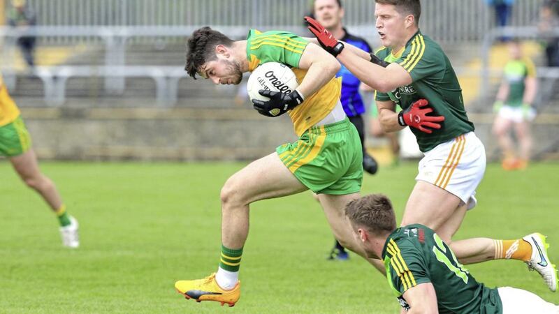 Donegal Ryan McHugh leaves Tomas McCann and Mark Sweeney of Antrim behind Picture by Margaret McLaughlin 