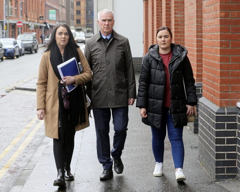 Jim Clinton whose wife was murdered by the UDA in 1994  with his daughters Siobhan and Roseann on thier way to see the Police Ombudsman as the report into the murders in south Belfast 1990-1998 is released Picture Mal McCann. 