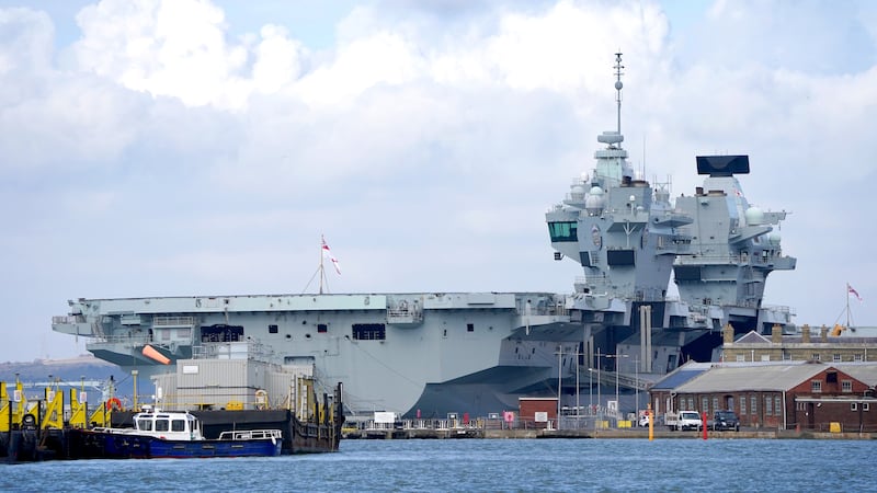 Security minister Tom Tugendhat has said it is ‘not acceptable’ that Royal Navy warship HMS Prince of Wales is sitting in dock when it should be out ‘defending our interests abroad’