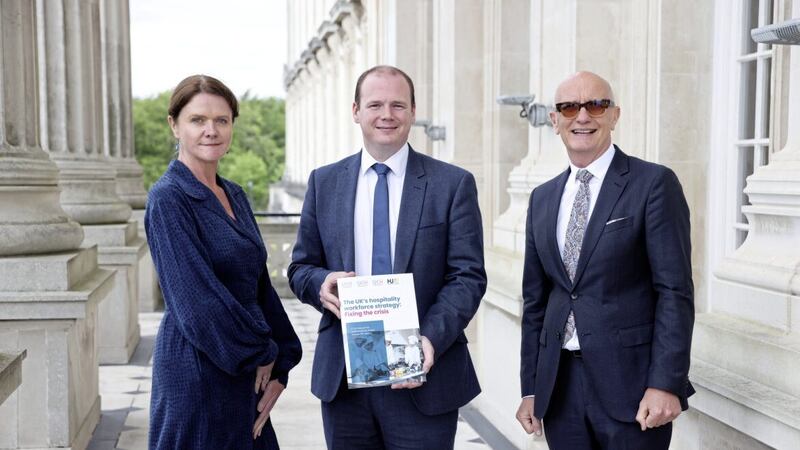 Pictured at the launch of the Hospitality Ulster Workforce Strategy at Parliament Buildings are Kate Nicholls (chief executive of UK Hospitality), Economy Minister Gordon Lyons and Colin Neill (chief executive of Hospitality Ulster). Picture: Kelvin Boyes/Press Eye 