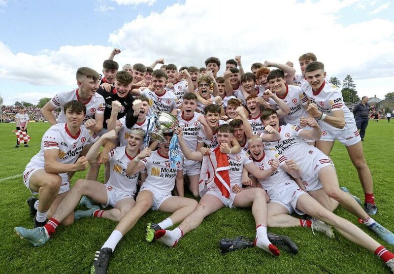 Caolan Donnelly of Fintona (second from right, at the front) celebrating the Ulster MFC Final triumph with his Tyrone team-mates.<br /> Pic: Margaret McLaughlin
